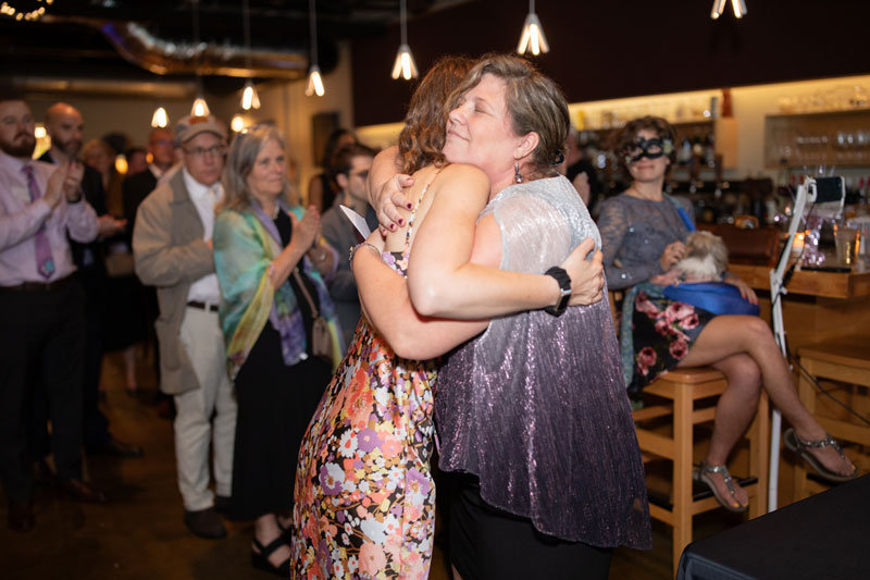 Susanne Preble hugging her cousin Danielle Festa